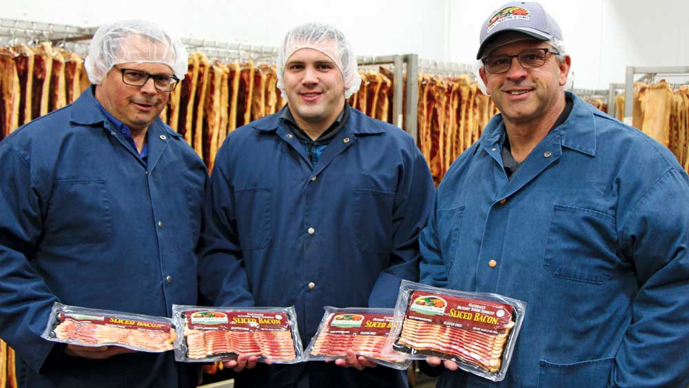 Employees with Martin & Sons’ signature bacon